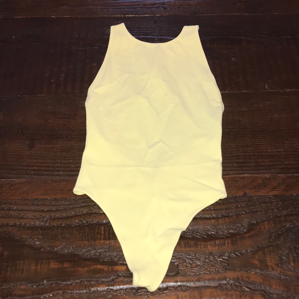 Pale yellow thing bodysuit